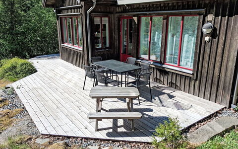Lövekulle: Wood, Porch, Door, Deck, Cottage, Siding, Hardwood, Outdoor Furniture, Plank, Outdoor Table