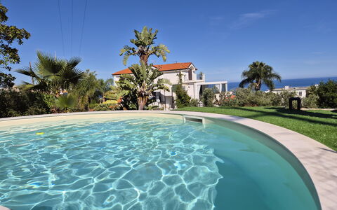Oasis Villa Sanremo: Blue, Swimming Pool, Resort, Eco Hotel, Leisure, Shade, Outdoor Furniture, Landscaping, Hotel
