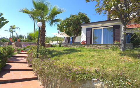 Oasis Villa Sanremo: Shrub, Resort, Garden, Eco Hotel, Landscaping, Shade, Hacienda, Villa, Backyard