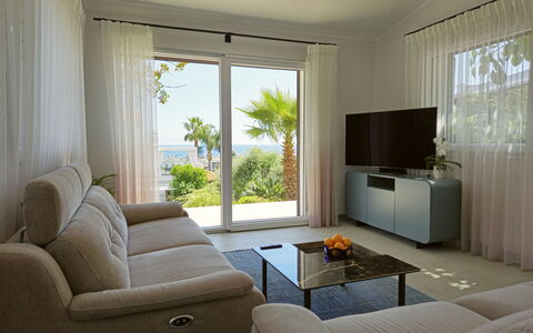 Oasis Villa Sanremo: Furniture, Interior Design, Couch, Apartment, Living Room, Home, Floor, Flooring, Lighting, Table