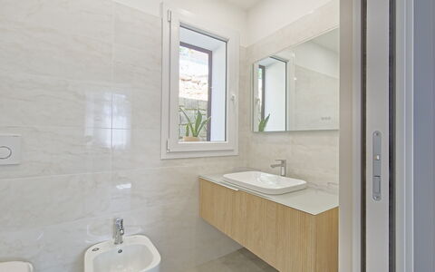Oasis Villa Sanremo: Flooring, Bathroom, Plumbing Fixture, Floor, Sink, Bathroom Sink, Interior Design, Toilet, Tap, Plumbing