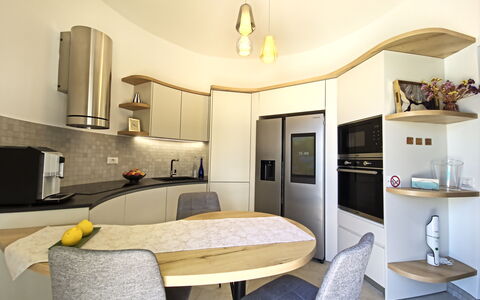 Oasis Villa Sanremo: Furniture, Interior Design, Flooring, Wood, Ceiling, Kitchen, Floor, Countertop, Lighting, Room