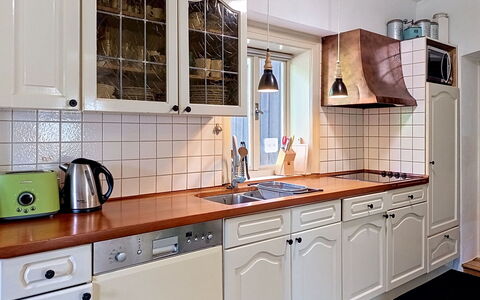 Jizera Cottage: Kitchen, Countertop, Cabinetry, Interior Design, Kitchen Sink, Flooring, Kitchen Appliance, Plumbing Fixture, Sink, Tap