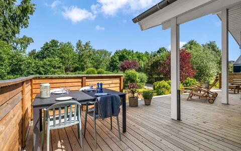 Rise - 600M from the Sea: Wood, Furniture, Wood Flooring, Porch, Outdoor Furniture, Hardwood, Chair, Deck, Shade, Table