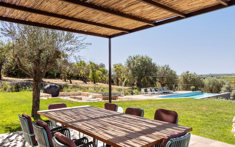 Villa Maddalena: Furniture, Outdoor Furniture, Chair, Outdoor Table, Garden, Shade, Outdoor Structure, Patio, Backyard, Natural Material