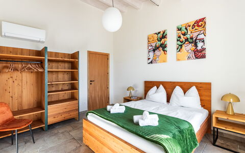 Villa Maddalena: Wood, Furniture, Flooring, Interior Design, Floor, Room, Wood Stain, Bedroom, Wood Flooring, Bed
