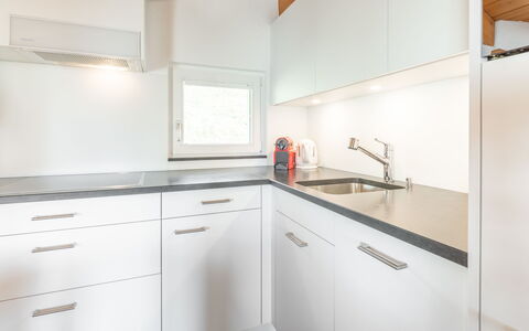 Darschalè 11: Kitchen, Countertop, Interior Design, Flooring, Wood, Cabinetry, Ceiling, Floor, Home, Kitchen Sink