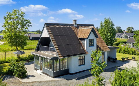 Aaro - 275M from the Sea: Grass, Building, Roof, House, Home, Residential Area, Shrub, Cottage, Architecture
