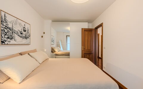 Sun: Furniture, Interior Design, Bed, Floor, Flooring, Wall, Bedroom, Room, Wood, Ceiling