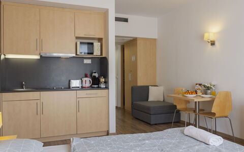 Holiday Club 3: Furniture, Interior Design, Wall, Bed, Bedroom, Floor, Wood, Flooring, Room, Textile