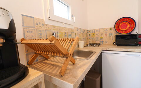 Sveva: Wood, Furniture, Interior Design, Room, Wood Stain, Major Appliance, Chair, Kitchen Appliance, Kitchen, Home Appliance