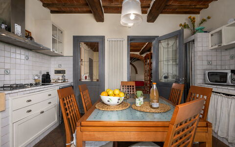 Podere Il Pozzangone, Lucignano: Furniture, Interior Design, Flooring, Wood, Kitchen, Countertop, Ceiling, Cabinetry, Table, Chair