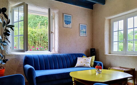 L'Ancienne Ferme: Furniture, Interior Design, Wall, Couch, Flooring, Floor, Lighting, Home, Room, Living Room