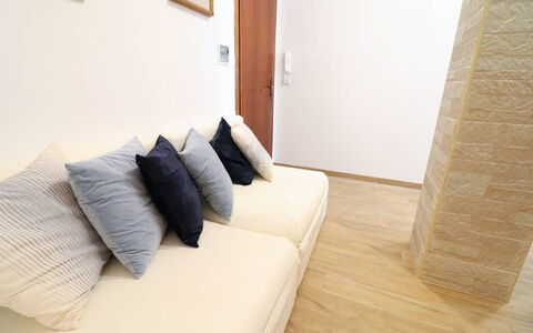 Casa Aurora a Otranto: Furniture, Flooring, Floor, Couch, Interior Design, Wood, Cushion, Living Room, Wood Flooring, Throw Pillow