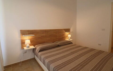 Nausica: Bed, Furniture, Bedroom, Interior Design, Wood, Bedding, Bed Sheet, Floor, Flooring, Linens
