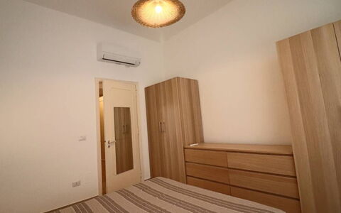 Nausica: Bed, Furniture, Interior Design, Bedroom, Wood, Flooring, Floor, Room, Bedding, Bed Sheet