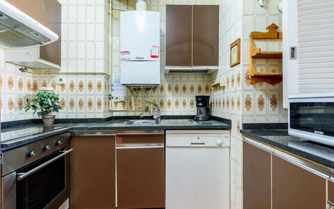 Helios: Kitchen, Kitchen Appliance, Major Appliance, Countertop, Flooring, Wood, Kitchen Stove, Cabinetry, Home Appliance, Interior Design