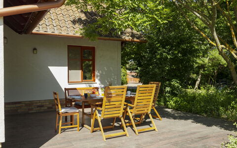 Villa Canela: Wood, Furniture, Outdoor Furniture, Wood Stain, Hardwood, Shade, Chair, Cottage, Outdoor Table, Porch