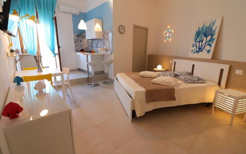 Casa Maya a Otranto: Furniture, Interior Design, Flooring, Floor, Room, Ceiling, Bedroom, Chair, Apartment, Bed