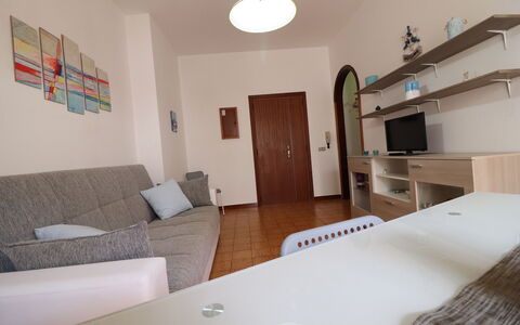 Margherita: Furniture, Flooring, Interior Design, Floor, Wood, Room, Living Room, Television, Lighting, Table