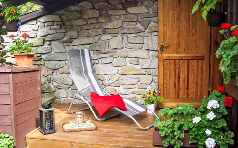 Herlíkovice: Flowerpot, Furniture, Outdoor Furniture, Garden, Houseplant, Chair, Hardwood, Wood Stain, Yard, Landscaping