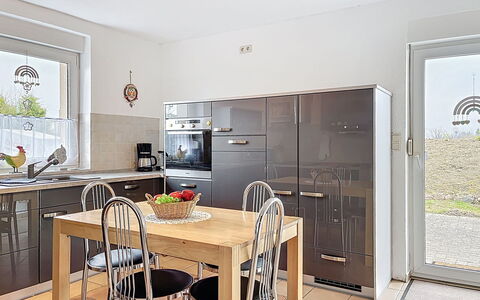 Ankerplatz: Furniture, Kitchen, Countertop, Interior Design, Flooring, Cabinetry, Kitchen Appliance, Chair, Floor, Wood