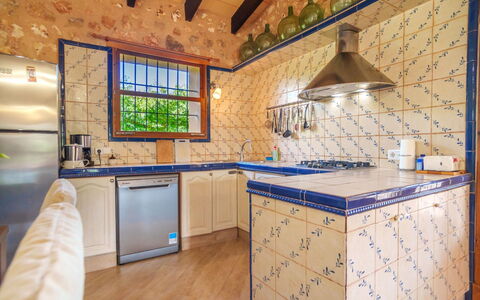 Casa Geranios: Flooring, Floor, Interior Design, Tile, Kitchen, Ceiling, Room, Wood Stain, Countertop, Mosaic