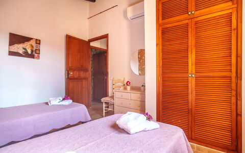 Casa Geranios: Floor, Apartment, Door, Wood Stain, Ceiling, Bedroom, Hardwood, Home Door, Bed, Bedding