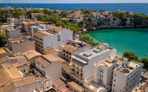 Near the Sea: City, Residential Area, Apartment, Human Settlement, Sea, Coast, Balcony, Condominium, Estate, Resort Town