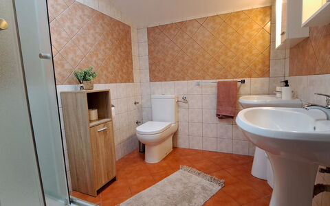 Kristalis: Bathroom Sink, Bathroom, Plumbing Fixture, Flooring, Toilet Seat, Sink, Floor, Toilet, Interior Design, Tap