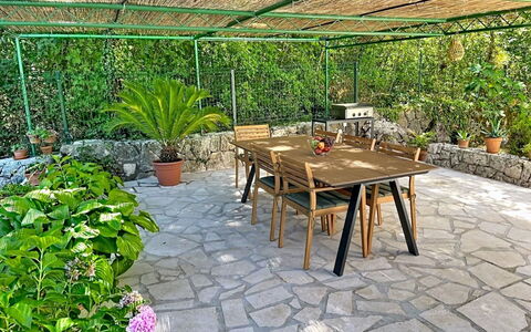 Orba: Flagstone, Garden, Shade, Outdoor Furniture, Backyard, Eco Hotel, Chair, Resort, Flowerpot, Landscaping