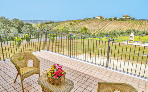 La Casa del Vino: Furniture, Chair, Outdoor Furniture, Fence, Garden, Outdoor Table, Balcony, Kitchen & Dining Room Table, Landscaping, Eco Hotel