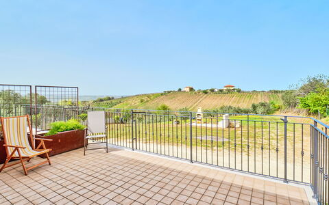La Casa del Vino: Interior Design, Apartment, Balcony, Hardwood, Wood Stain, Wood Flooring, Handrail, Daylighting, Hotel, Penthouse Apartment