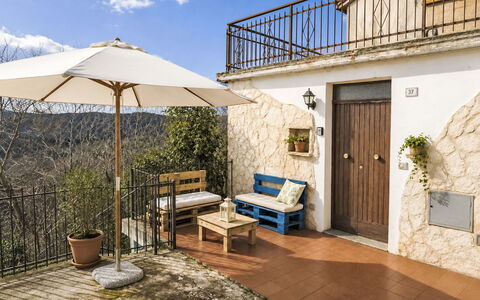 Casetta Belvedere: Interior Design, Apartment, Balcony, Hardwood, Wood Stain, Wood Flooring, Handrail, Daylighting, Hotel, Penthouse Apartment