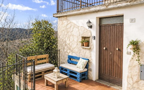 Casetta Belvedere: Interior Design, Apartment, Balcony, Hardwood, Wood Stain, Wood Flooring, Handrail, Daylighting, Hotel, Penthouse Apartment