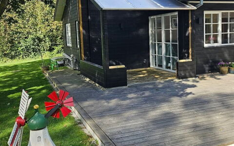 Fridel - 400M from the Sea: Wood, House, Home, Cottage, Roof, Siding, Door, Garden Buildings, Garden, Porch