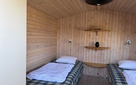 Haley - 380M from the Sea: Wood, Floor, Flooring, Bedroom, Interior Design, Furniture, Bed, Ceiling, Room, Wood Stain