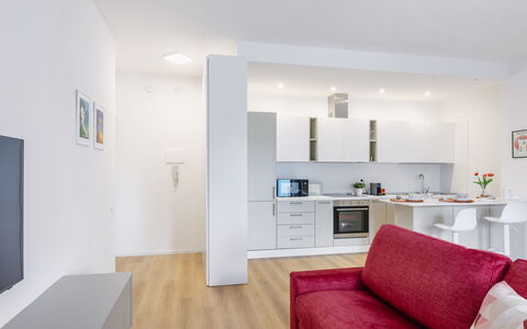 Suite Pineta: Furniture, Interior Design, Flooring, Floor, Ceiling, Room, Couch, Living Room, Home, Apartment