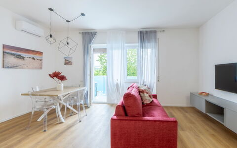 Suite Pineta: Interior Design, Flooring, Furniture, Floor, Wood Flooring, Wood, Room, Ceiling, Living Room, Couch