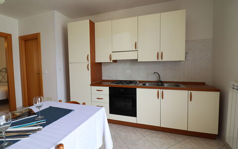 Marta: Flooring, Wood, Furniture, Kitchen, Floor, Interior Design, Kitchen Appliance, Major Appliance, Countertop, Cabinetry