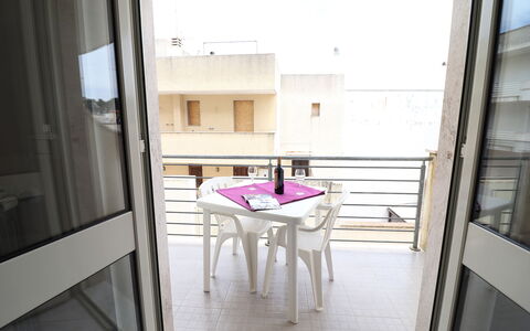 Marta: Floor, Furniture, Chair, Balcony, Glass, Apartment, Wood Stain, Kitchen & Dining Room Table, Outdoor Table, Outdoor Furniture