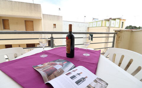 Marta: Furniture, Table, Chair, Flooring, Interior Design, Floor, Restaurant, Tablecloth, Kitchen & Dining Room Table, Balcony