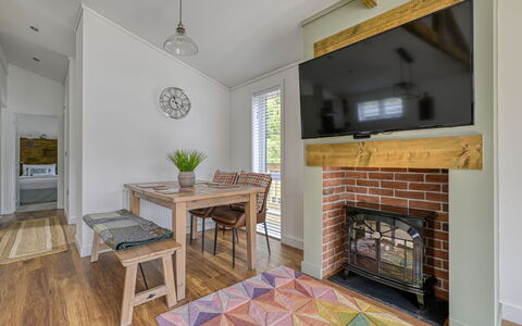 Loch Ness Hamptons Lodge: Flooring, Furniture, Interior Design, Floor, Wood, Ceiling, Wood Flooring, Room, Living Room, Lighting