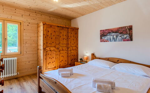 Sorico Albonico 697: Wood, Ceiling, Furniture, Bedroom, Hardwood, Room, Bed, Wood Stain, Bed Frame, Bed Sheet