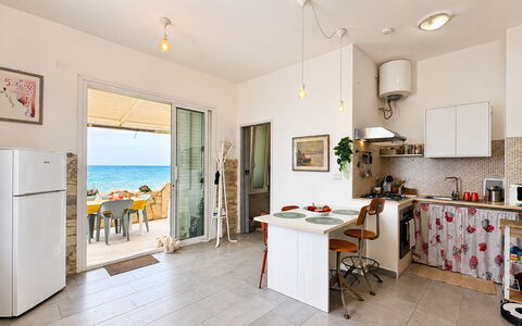 La Casa in Riva al Mare: Furniture, Floor, Apartment, Chair, Shade, Kitchen & Dining Room Table, Houseplant, Resort, Balcony, Penthouse Apartment