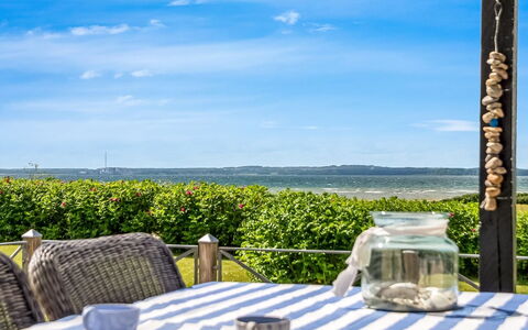 Gustav - 50M from the Sea: Sky, Furniture, Outdoor Furniture, Table, Horizon, Summer, Outdoor Table, Chair, Shade, Sea