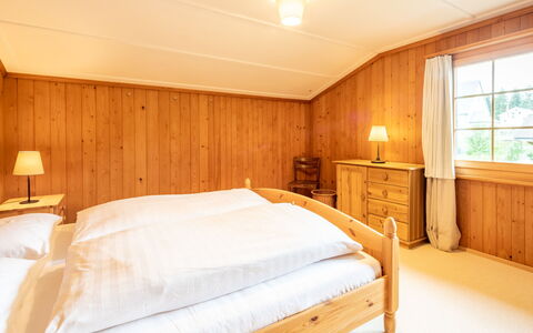 Chalet Cauma: Wood, Interior Design, Bed, Bedroom, Furniture, Bed Frame, Floor, Bed Sheet, Room, Bedding