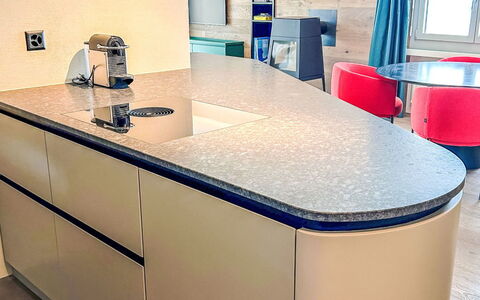 Casa Partnun 4-3: Flooring, Interior Design, Wood, Countertop, Floor, Furniture, Kitchen, Lighting, Cabinetry, Kitchen Appliance