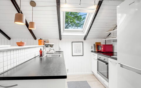 Ragnborg - 700M from the Sea: Kitchen, Wood, Ceiling, Interior Design, Flooring, Countertop, Major Appliance, Floor, Kitchen Appliance, Attic
