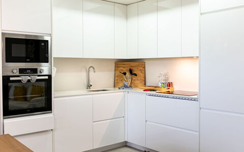 Sea Garden: Kitchen, Kitchen Appliance, Cabinetry, Countertop, Flooring, Wood, Interior Design, Major Appliance, Furniture, Floor